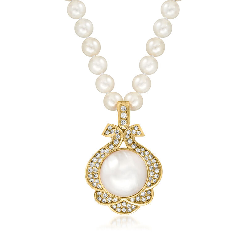 C. 1980 Vintage 17mm Cultured Mabe Pearl and 7mm Cultured Pearl Pendant Necklace with 1.50 ct. t.w. Diamonds in 14kt Yellow Gold image number 0