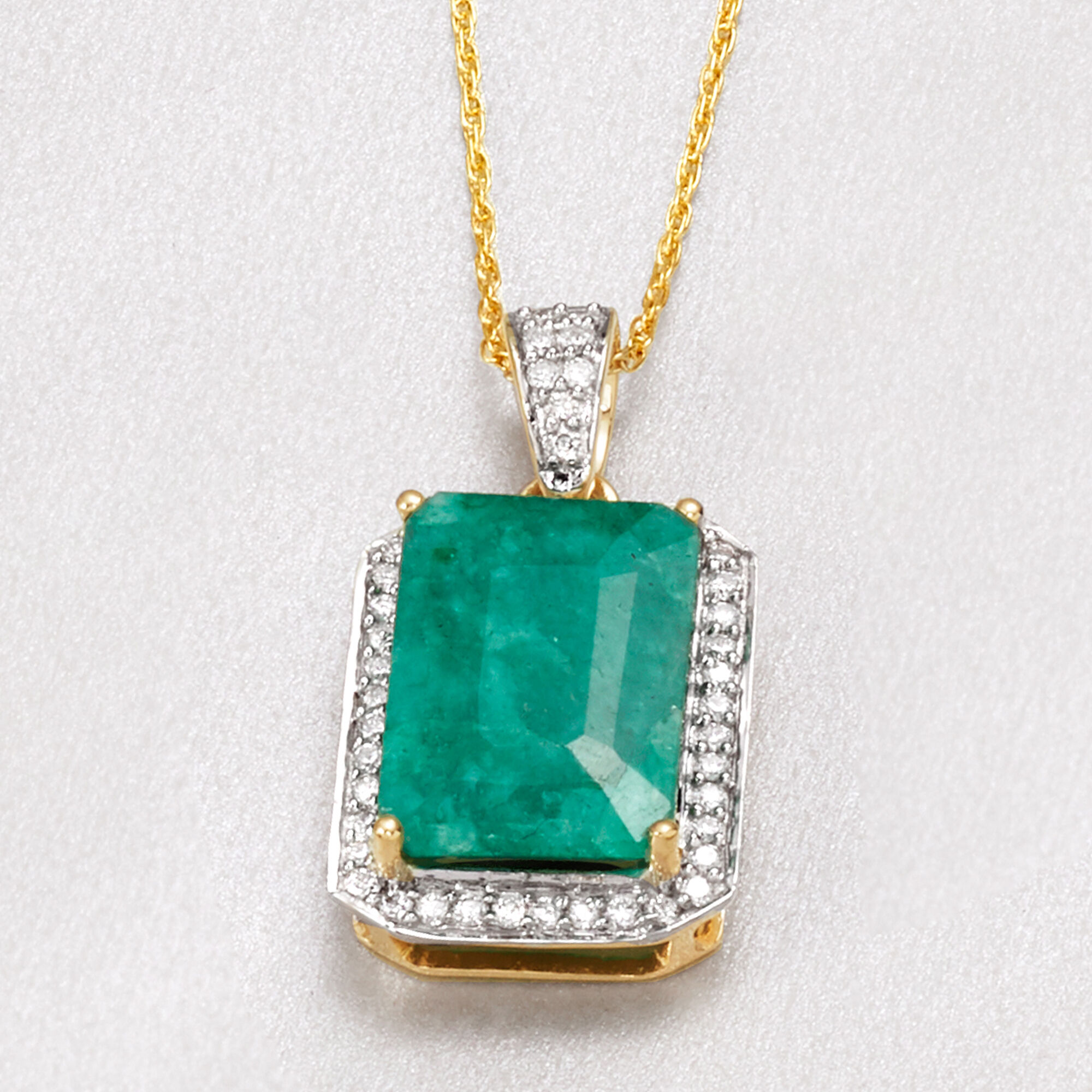 5.50 Carat Emerald and .25 ct. t.w. Diamond Pendant Necklace in 14kt Yellow Gold. 18