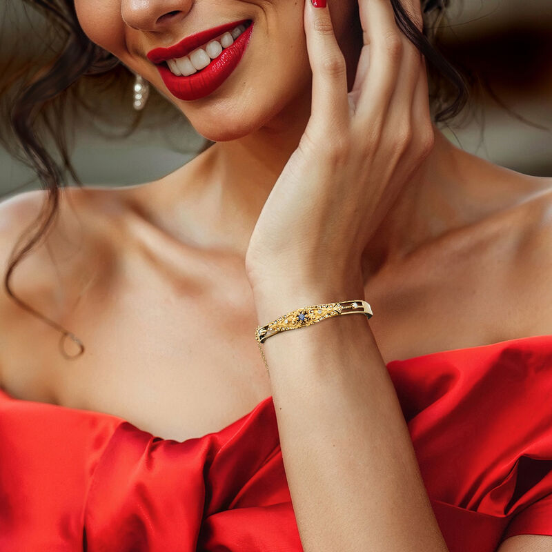 C. 1960 Vintage .15 Carat Sapphire and 1.4-2.5mm Cultured Pearl Bangle Bracelet with Diamonds in 14kt Yellow Gold. 7&quot; image number 1