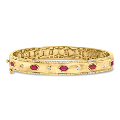.90 ct. t.w. Ruby and .26 ct. t.w. Diamond Bangle Bracelet in 18kt Gold Over Sterling