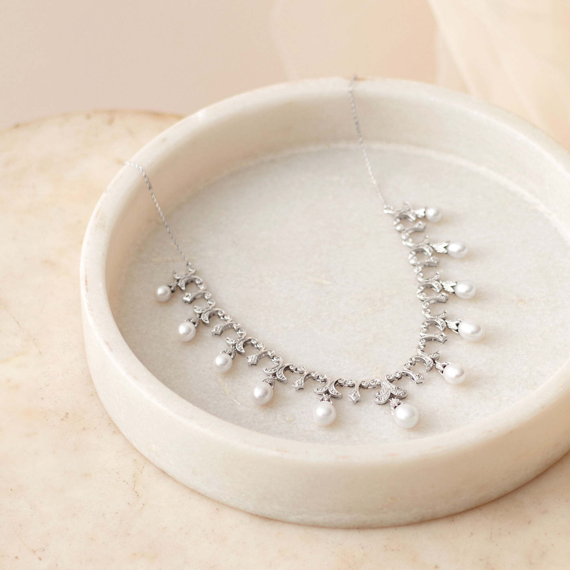 6-9mm Cultured Pearl and .20 ct. t.w. Diamond Necklace in
