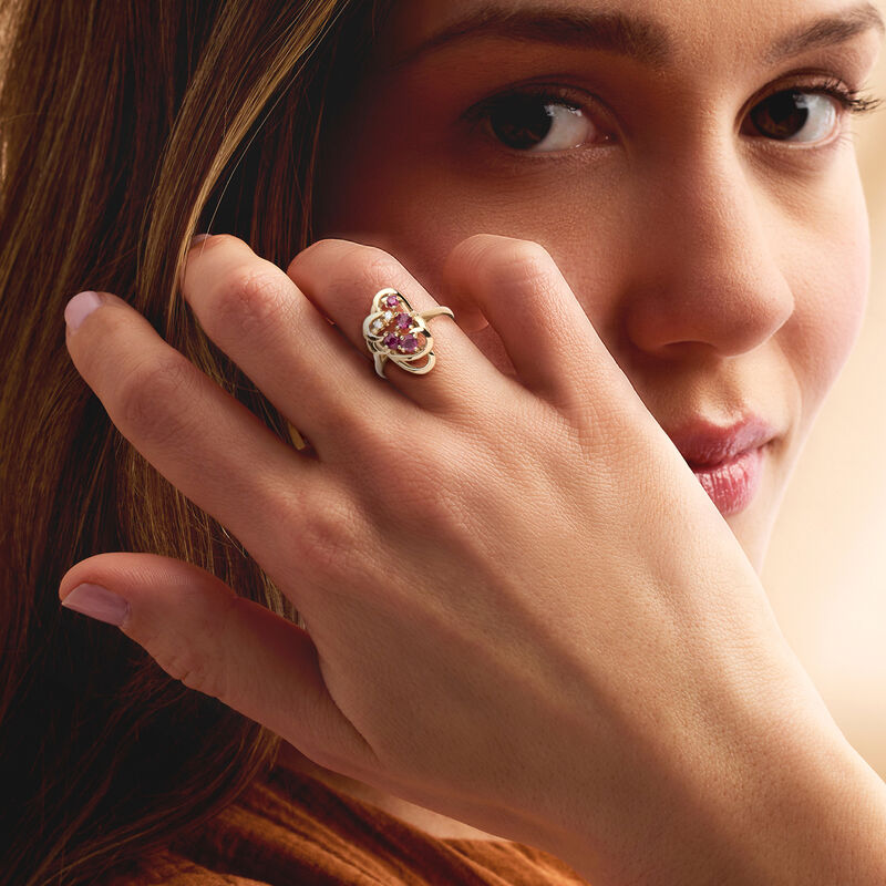 C. 1980 Vintage .50 ct. t.w. Ruby Swirl Ring with Diamonds in 14kt Yellow Gold. Size 5 image number 1