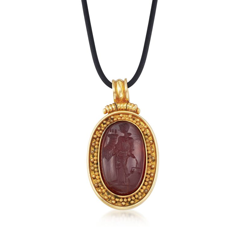 C. 1980 Vintage Carved Carnelian Lady Justice Pendant Necklace in 18kt Yellow Gold with Black Rubber Cord. 17&quot; image number 1