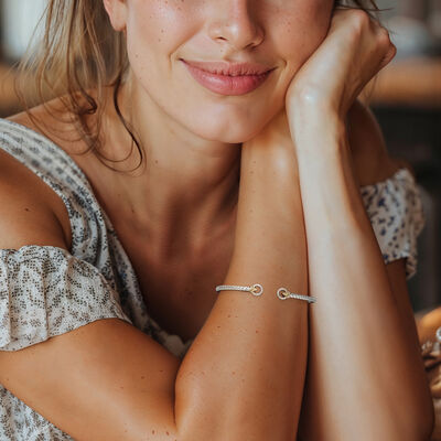 Charles Garnier "Touch of Gold" .10 ct. t.w. Diamond Fleur-De-Lis Cuff Bracelet in Sterling Silver with 14kt Yellow Gold