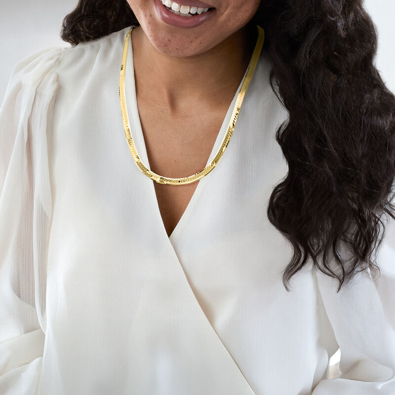 C. 1980 Vintage 7mm 14kt Yellow Gold Herringbone Necklace. 24" image number 1