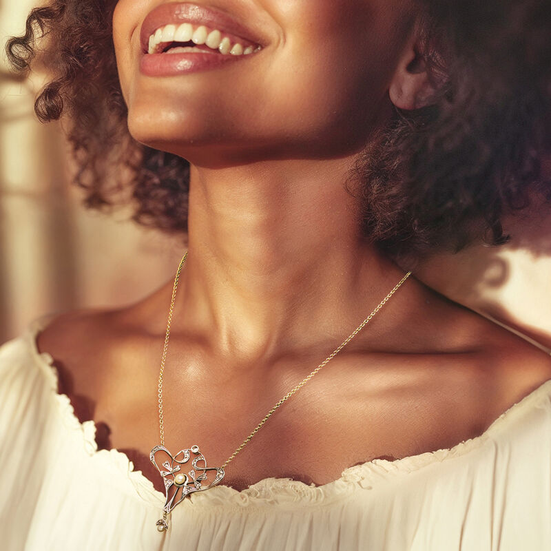 C. 1920 Vintage 3.5-4.5mm Cultured Pearl and .85 ct. t.w. Diamond Necklace in Sterling Silver and 14kt Yellow Gold. 18.5" image number 1