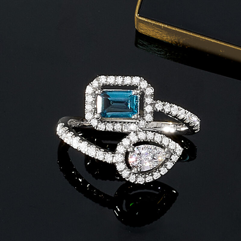 .50 Carat London Blue Topaz and .73 ct. t.w. Lab-Grown Diamond Bypass Ring in Sterling Silver image number 4
