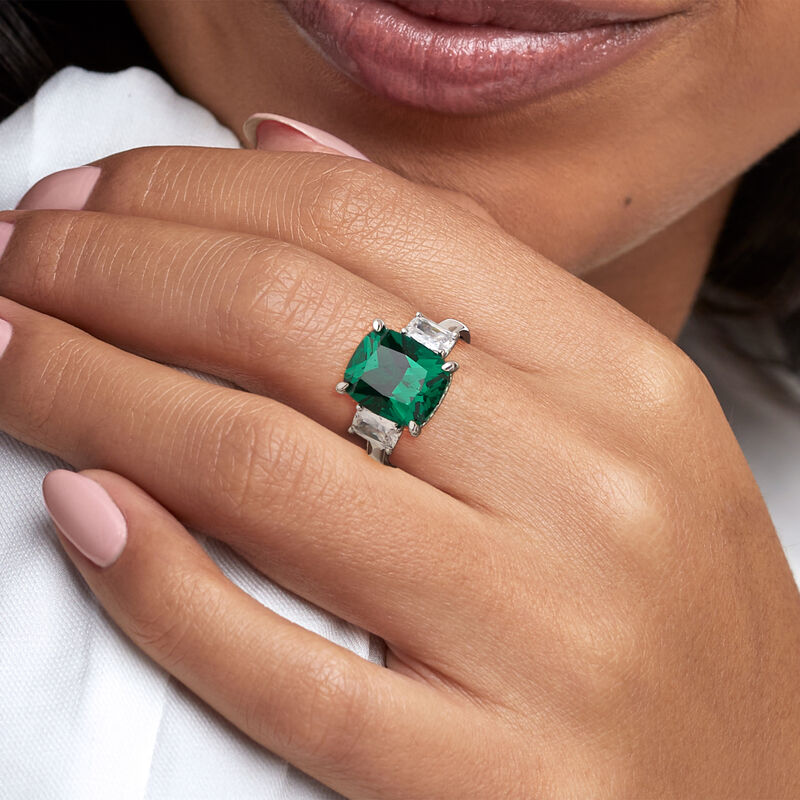 6.00 Carat Simulated Emerald and 1.10 ct. t.w. CZ Three-Stone Ring in Sterling Silver image number 1
