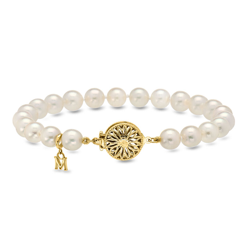 C. 1990 Vintage Mikimoto 7mm Cultured Pearl Bracelet in 14kt Yellow Gold. 7.5" image number 0