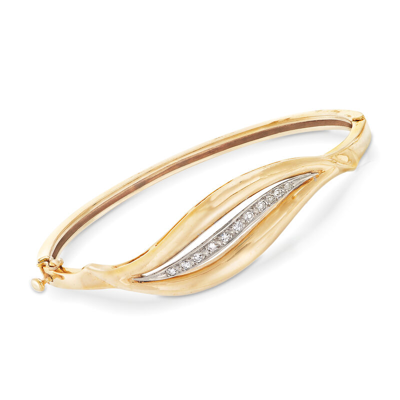 C. 1990 Vintage .25 ct. t.w. Diamond and 14kt Yellow Gold Open-Space Leaf Bangle Bracelet. 7&quot; image number 0