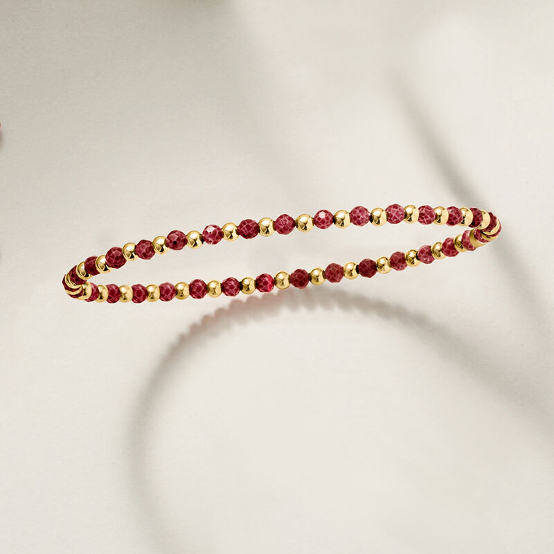 6.00 ct. t.w. Ruby and 10kt Yellow Gold Bead Stretch Bracelet image number 1
