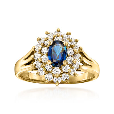 C. 1980 Vintage .55 Carat Sapphire and .80 ct. t.w. Diamond Ring in 14kt Yellow Gold