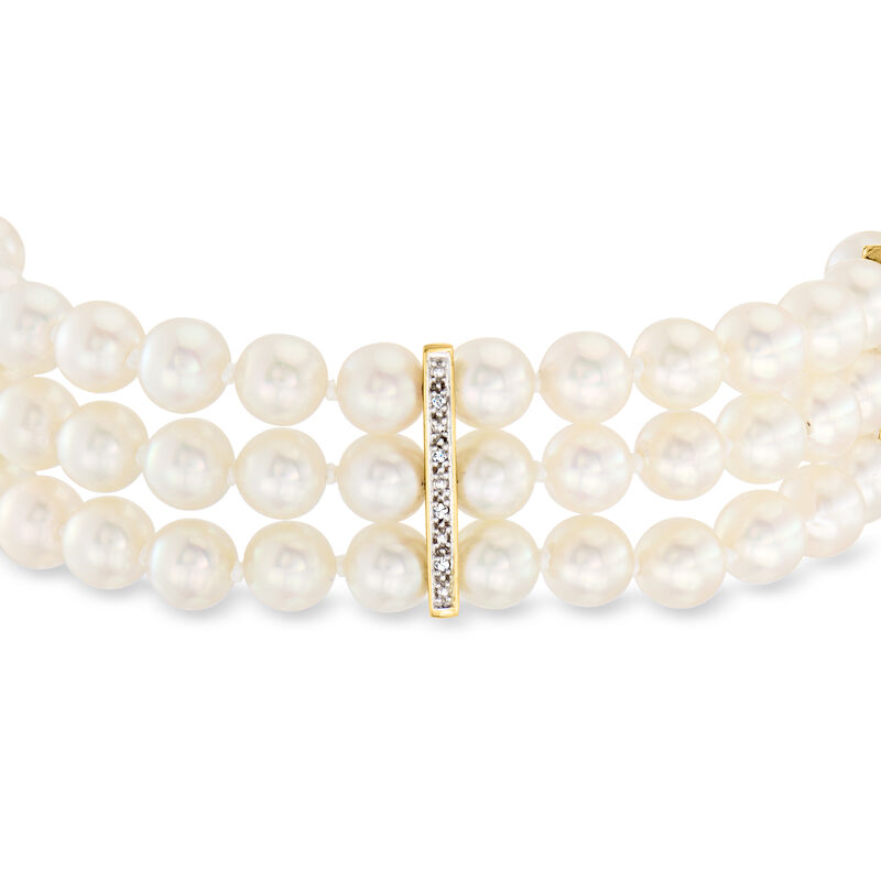 C. 1970 Vintage 6mm Cultured Pearl Three-Row Bracelet with .45 ct. t.w. Rubies and .10 ct. t.w. Diamonds in 14kt Yellow Gold. 7&quot; image number 2
