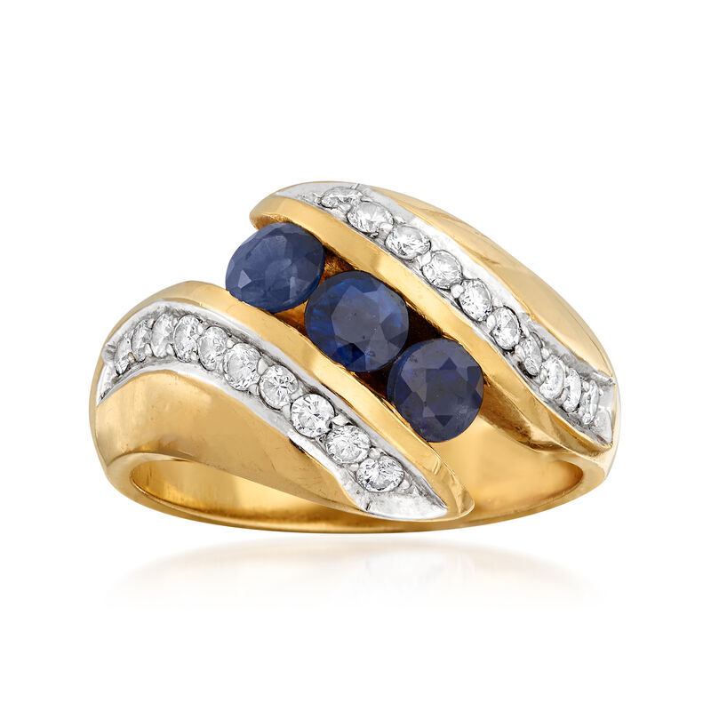C. 1980 Vintage .90 ct. t.w. Sapphire and .50 ct. t.w. Diamond Bypass Ring in 18kt Yellow Gold. Size 7.25 image number 0