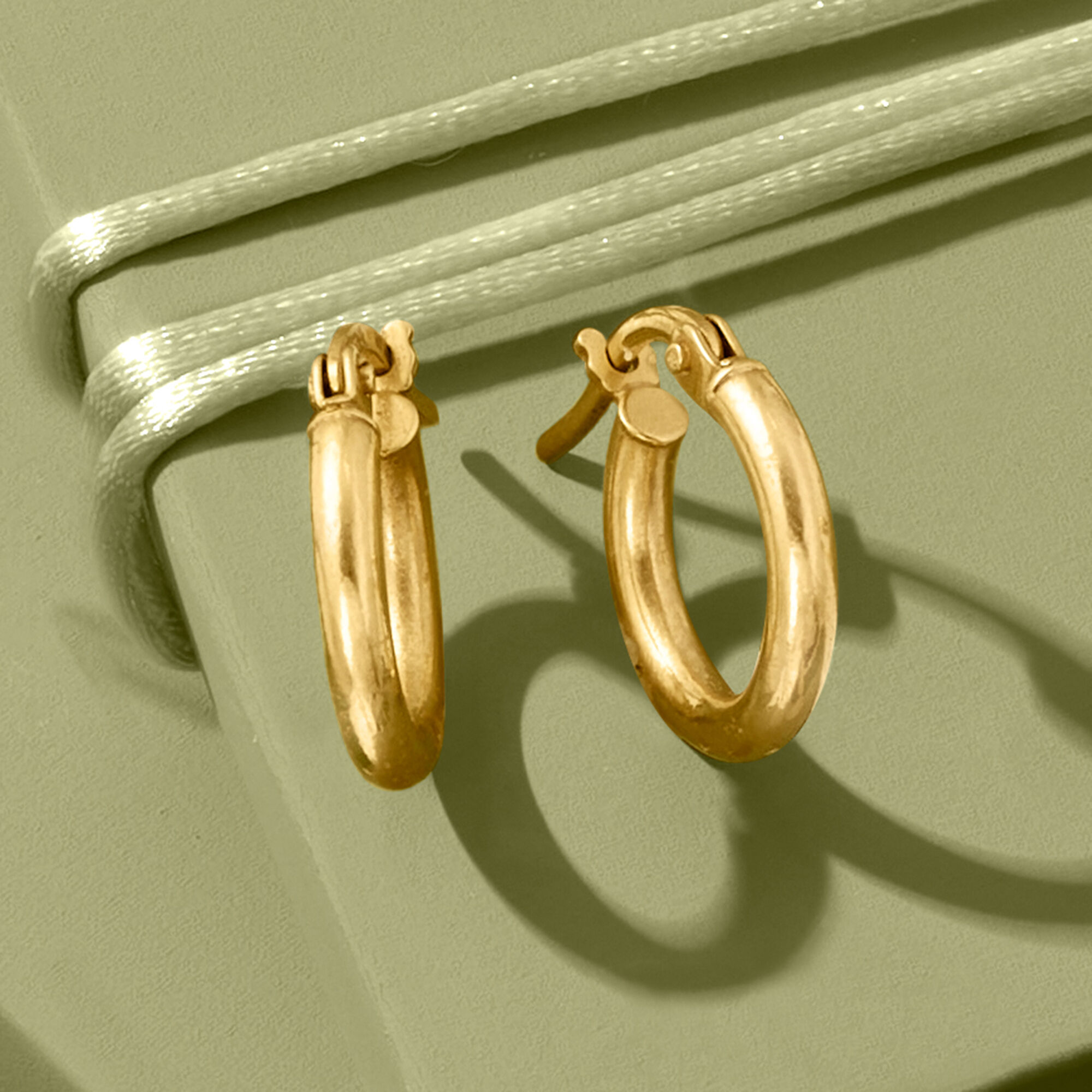 2mm 14kt Yellow Gold Small Hoop Earrings. 1 2
