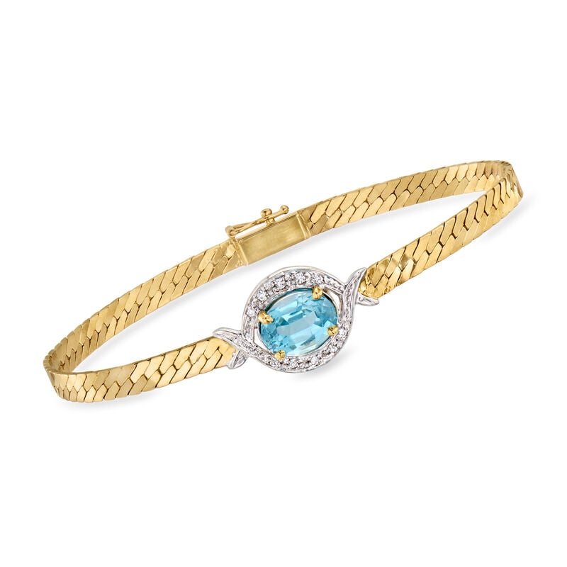C. 1990 Vintage 2.50 Carat Swiss Blue Topaz and .10 ct. t.w. Diamond Bracelet in 14kt Two-Tone Gold. 6.75" image number 0