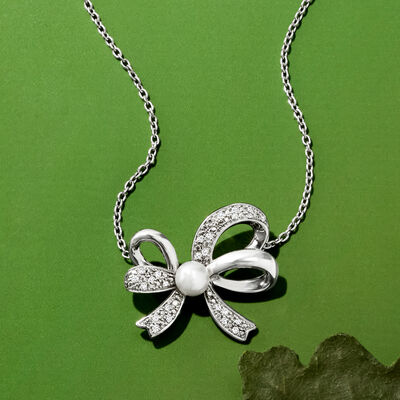 4.5-5mm Cultured Pearl and .11 ct. t.w. Diamond Bow Pendant Necklace in Sterling Silver