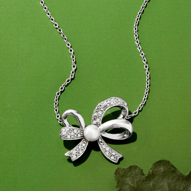 4.5-5mm Cultured Pearl and .11 ct. t.w. Diamond Bow Pendant Necklace in Sterling Silver. 18&quot; image number 2