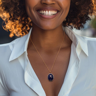 25.00 Carat Sapphire and .30 ct. t.w. White Topaz Pendant Necklace in 18kt Gold Over Sterling