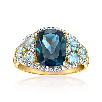 4.10 Carat London Blue Topaz Ring with 1.00 ct. t.w. Swiss Blue Topaz and .22 ct. t.w. Diamonds in 14kt Yellow Gold