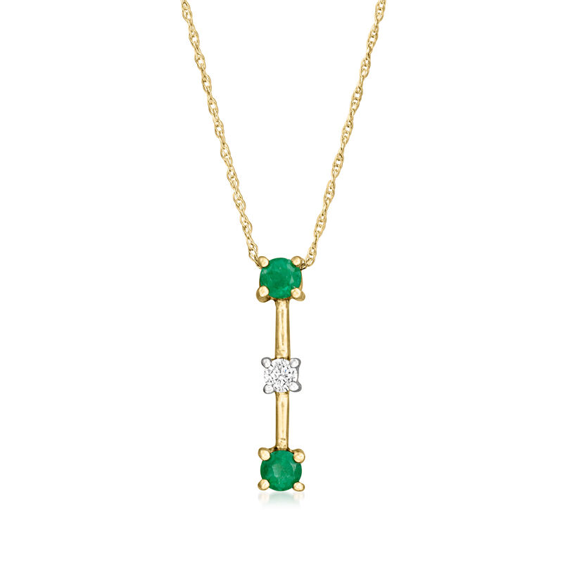 C. 1990 Vintage .30 ct. t.w. Emerald Pendant Necklace with Single Diamond in 14kt Yellow Gold. 18" image number 0