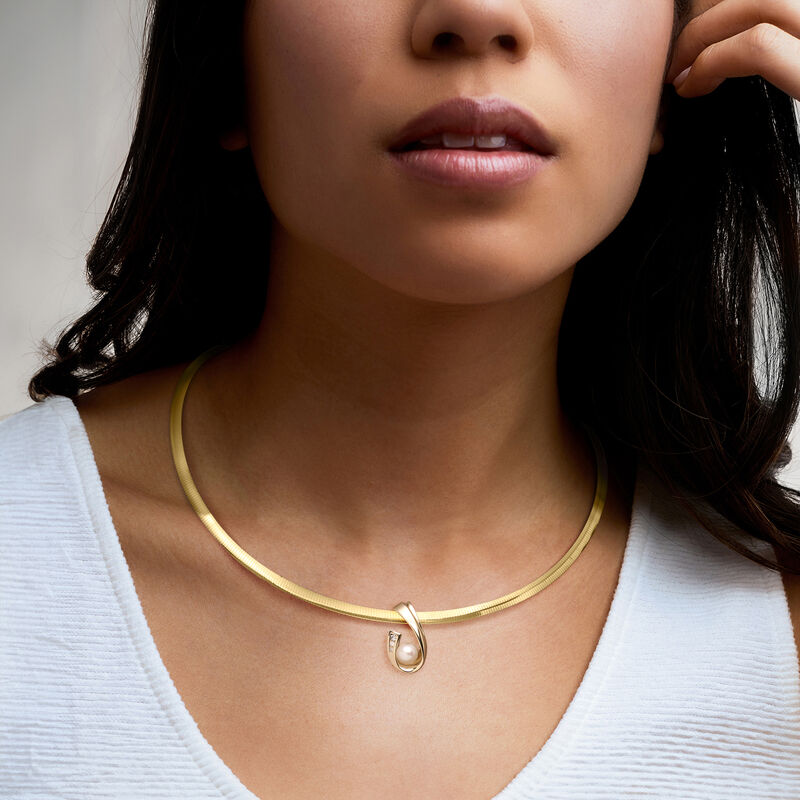 C. 1980 Vintage 6.5mm Cultured Pearl Curved Slide Pendant with Diamonds in 10kt Yellow Gold image number 1
