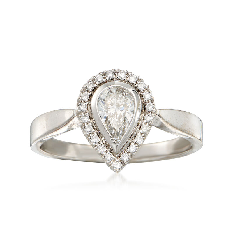 C. 1980 Vintage .57 ct. t.w. Pear-Shaped Diamond Halo Ring in 18kt White Gold. Size 7 image number 0