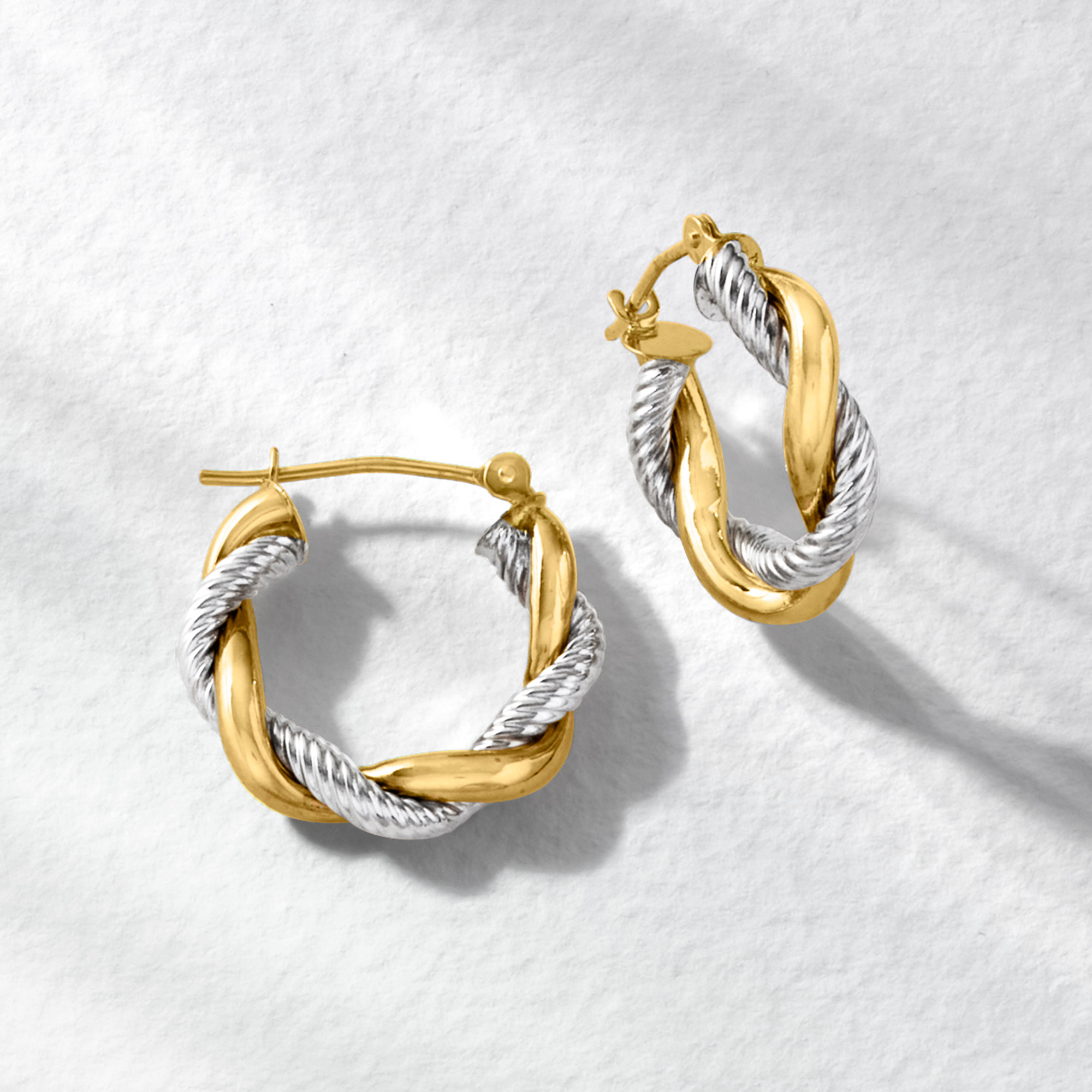 14kt Two-Tone Gold Twisted Hoop Earrings. 5/8