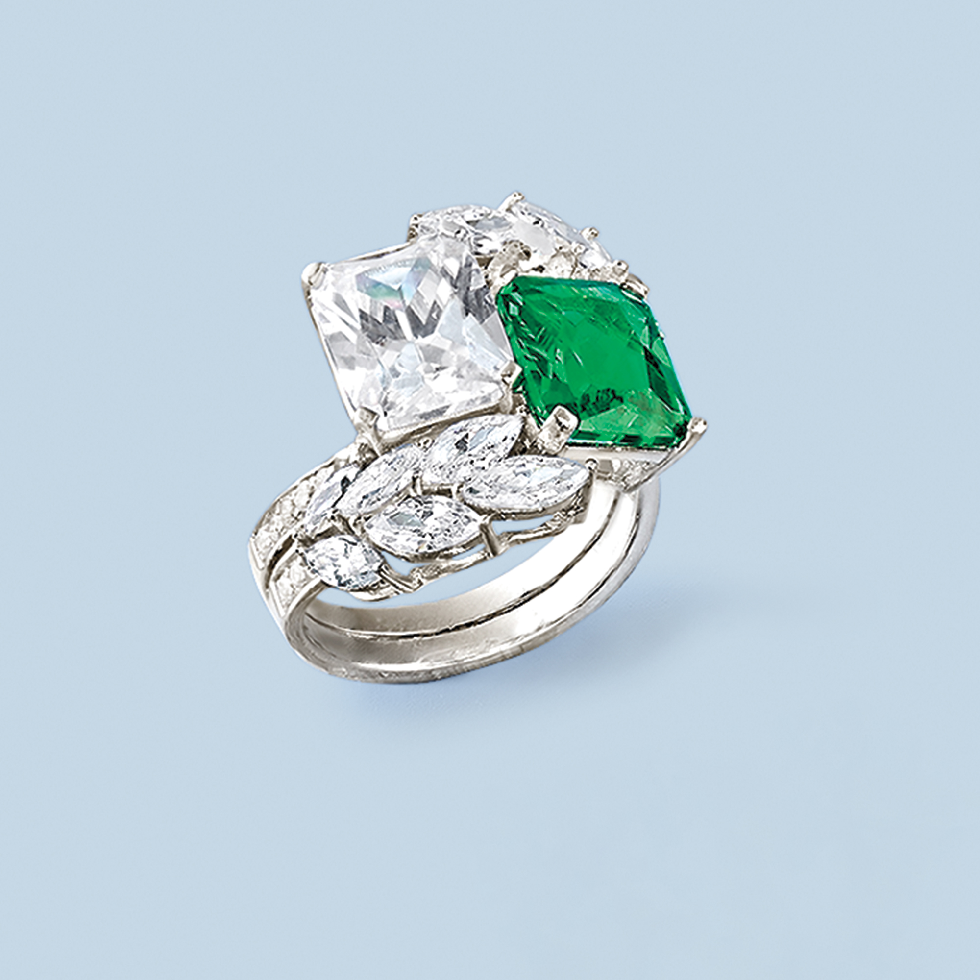 4.25 Carat Simulated Emerald and 6.85 ct. t.w. CZ Ring in Sterling